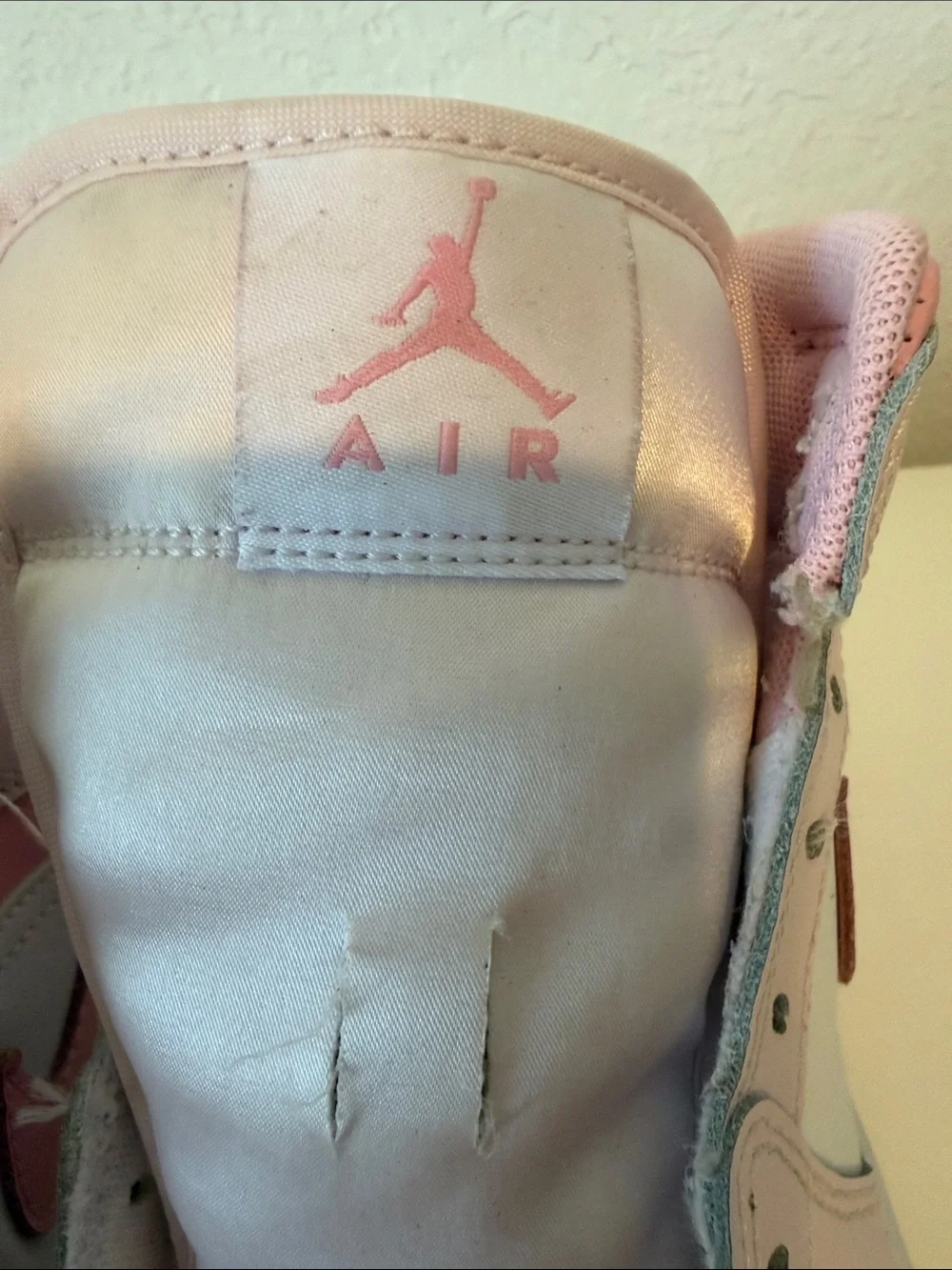 Nike Air Jordan Kids Pink and White High-Top Sneakers with Pink Swoosh